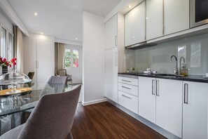Fridge, microwave, coffee/tea maker, electric kettle