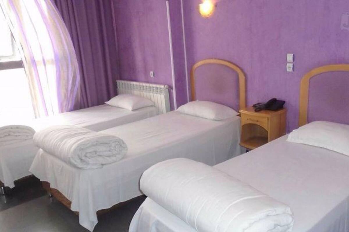 Triple Room, Non Smoking | Desk, blackout drapes, free WiFi, bed sheets