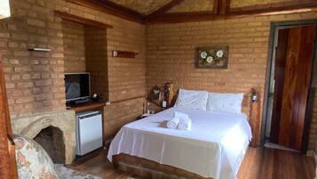 Quarto quádruplo | Frigobar, roupa de cama