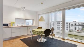 Apartment, Multiple Beds | Private kitchen | Fridge, oven, stovetop, dishwasher