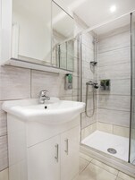 Shower, towels, soap, shampoo