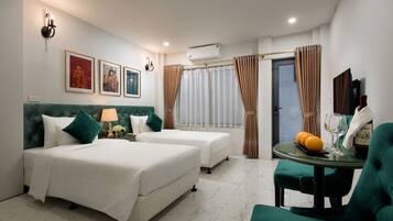 Deluxe Double or Twin Room | Minibar, in-room safe, desk, blackout curtains