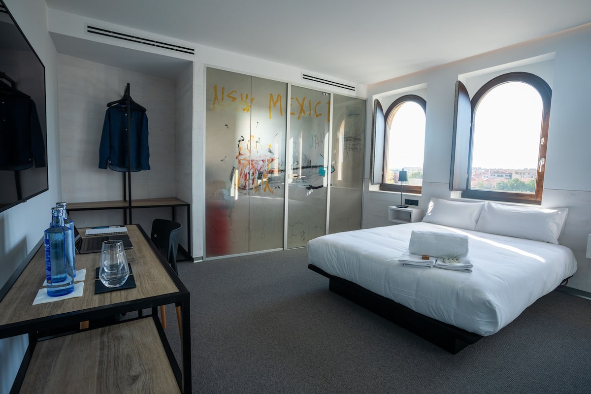 Premium bedding, memory-foam beds, in-room safe, individually decorated