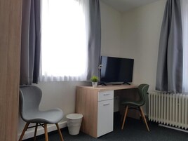 Desk, free WiFi, bed sheets