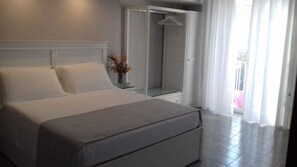 In-room safe, desk, laptop workspace, iron/ironing board