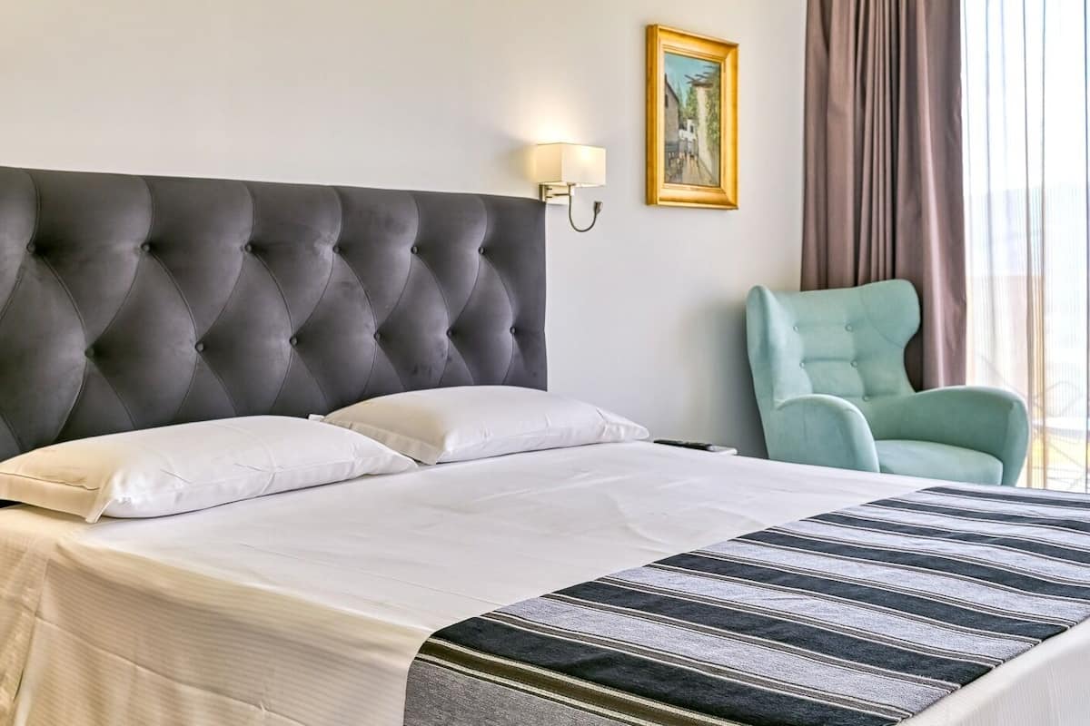 Hypo-allergenic bedding, down comforters, memory foam beds, in-room safe