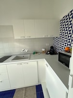 Fridge, microwave, stovetop, espresso maker