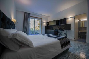 Standard Studio | Hypo-allergenic bedding, down comforters, memory foam beds, in-room safe