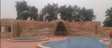 Outdoor pool, pool umbrellas, sun loungers