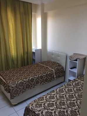 Chambre Standard avec lits jumeaux, 2 lits une place | Fer et planche à repasser, Wi-Fi