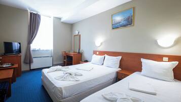 Triple Room | 1 bedroom, minibar, desk, blackout curtains