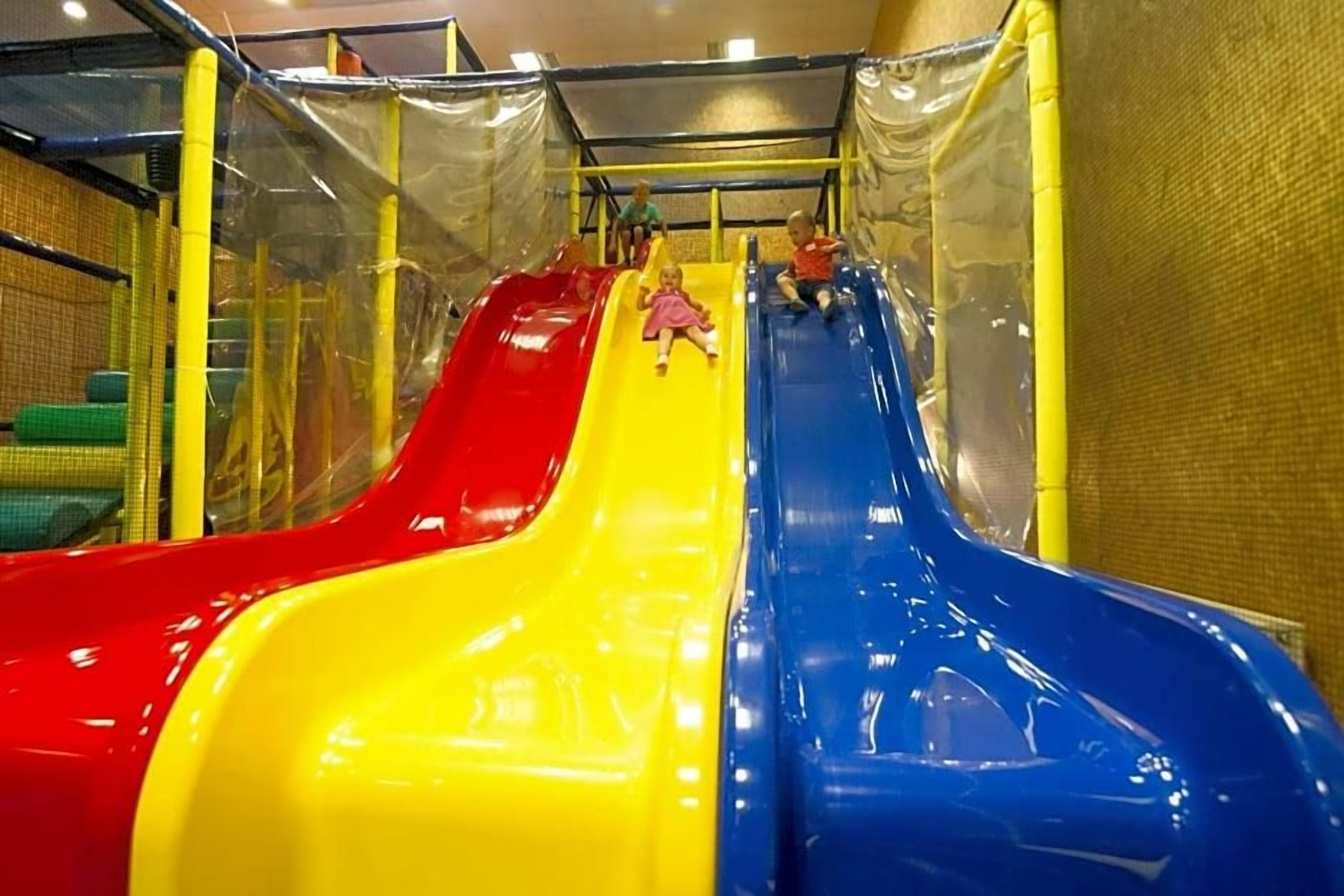 A playground with multiple slides.