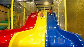 A playground with multiple slides.