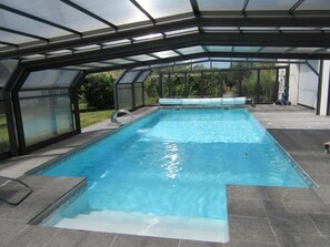 Seasonal outdoor pool, pool loungers