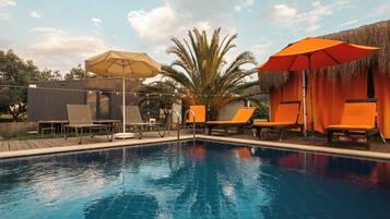 Outdoor pool, open 9:00 AM to 7:00 PM, pool umbrellas, sun loungers