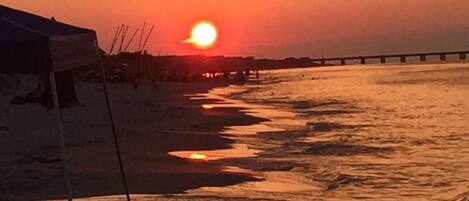 On the beach, sun loungers, beach towels