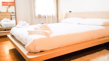 2 dormitorios, tabla de planchar con plancha, cuna de viaje y wifi