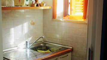 Apartment, 1 Bedroom, Balcony | Private kitchen | Coffee/tea maker, highchair