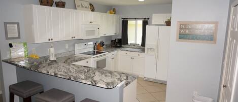 Fridge, microwave, coffee/tea maker, toaster