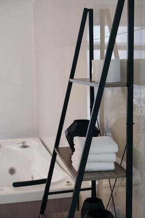 Hair dryer, towels, soap, shampoo