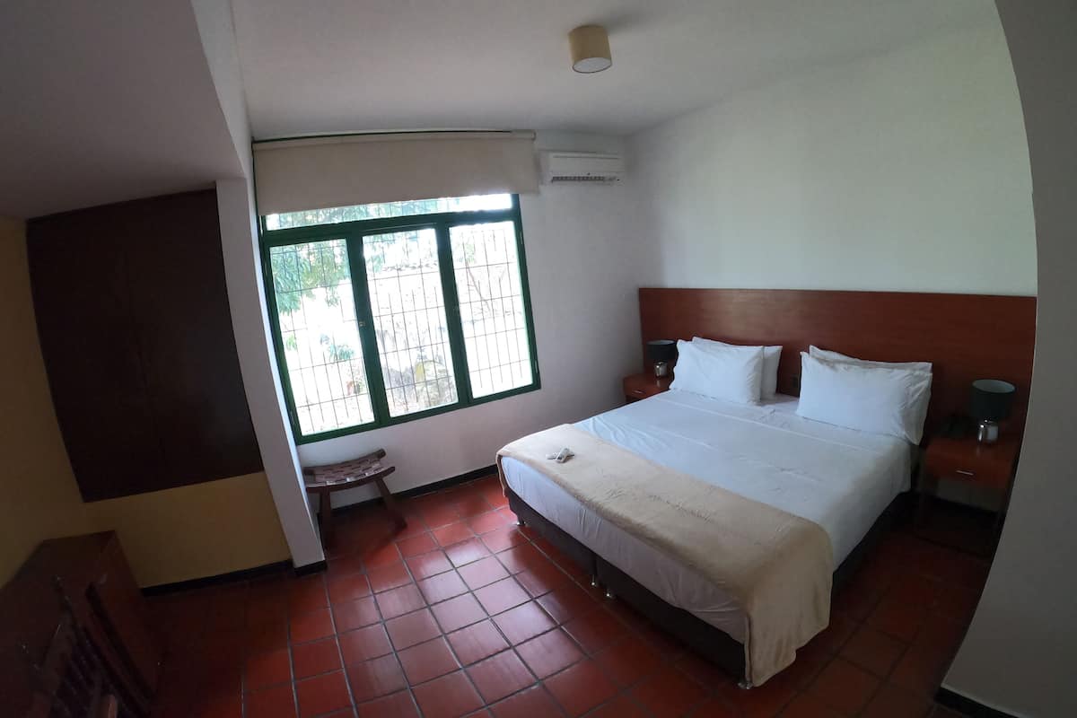 Deluxe Double Room | In-room safe, desk, iron/ironing board, bed sheets
