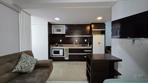 Apartamento tradicional, 1 cama doble con sofá cama, Aire acondicionado | Zona de estar | Una Smart TV