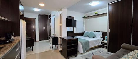 Apartamento tradicional, 1 cama de casal e sofá-cama, ar-condicionado | 1 quarto, ferros/tábuas de passar roupa, Wi-Fi de cortesia