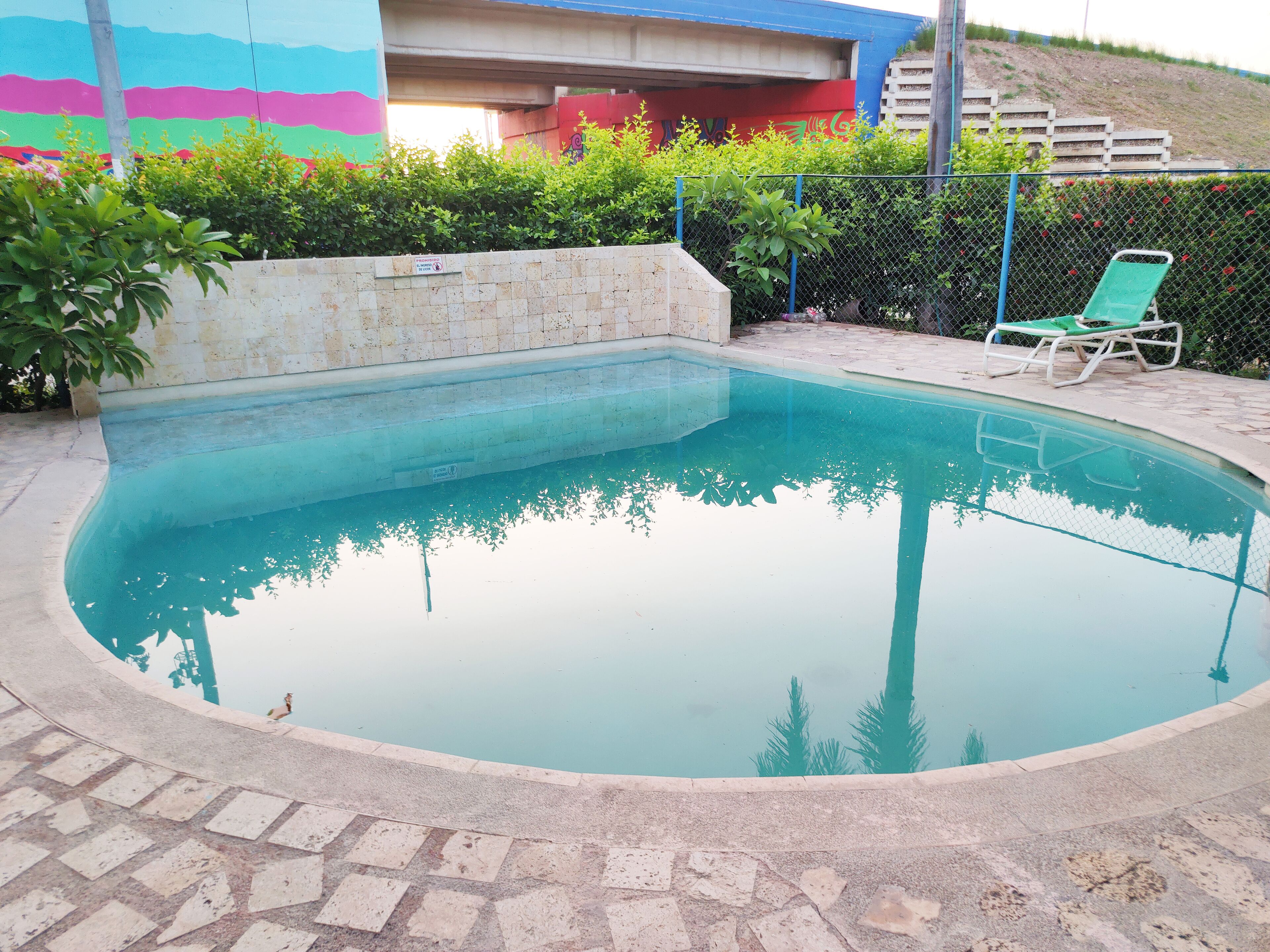 outdoor pool, pool umbrellas, pool loungers