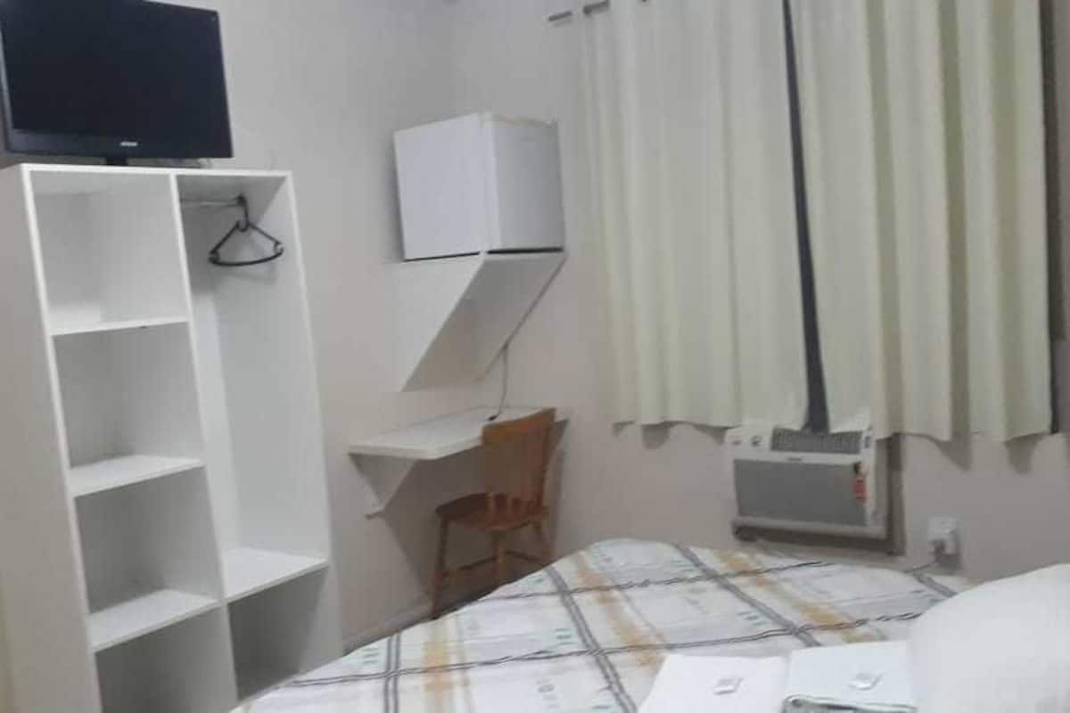Blackout curtains, iron/ironing board, free WiFi, bed sheets