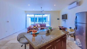 Suite, 1 Bedroom, Non Smoking | Living area | Flat-screen TV - Estrella Del Mar - One Bedroom Suite 102 by Skyrun (Isla Mujeres)