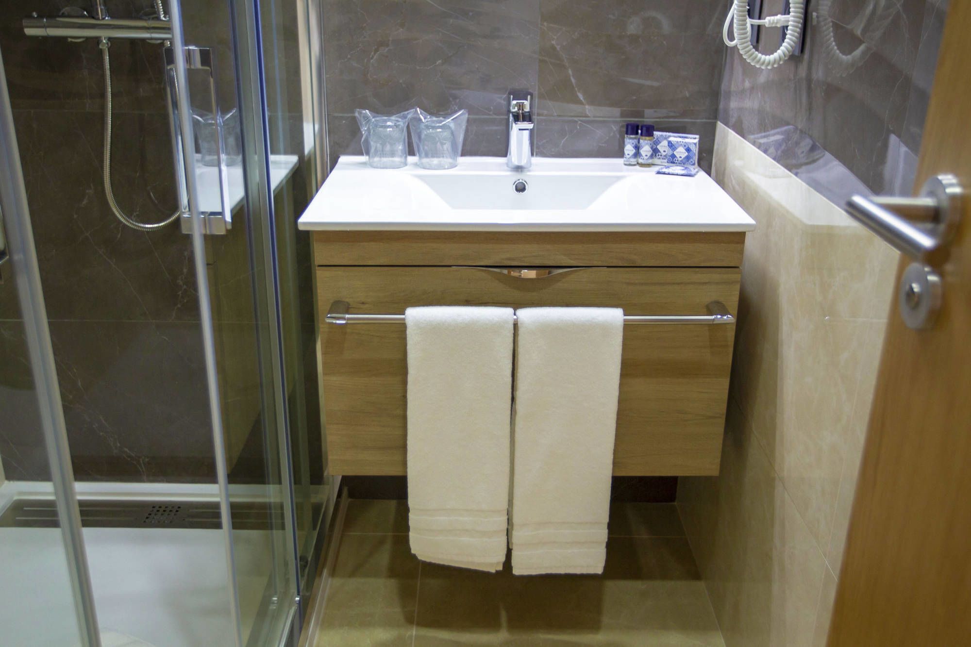 free toiletries, hair dryer, towels, soap