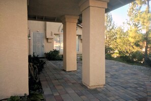 Stroll through the beautifully landscaped grounds to the entrance of this charming building.