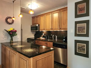 Fridge, microwave, oven, stovetop - Lift One - Top floor one bedroom with a view (Aspen)
