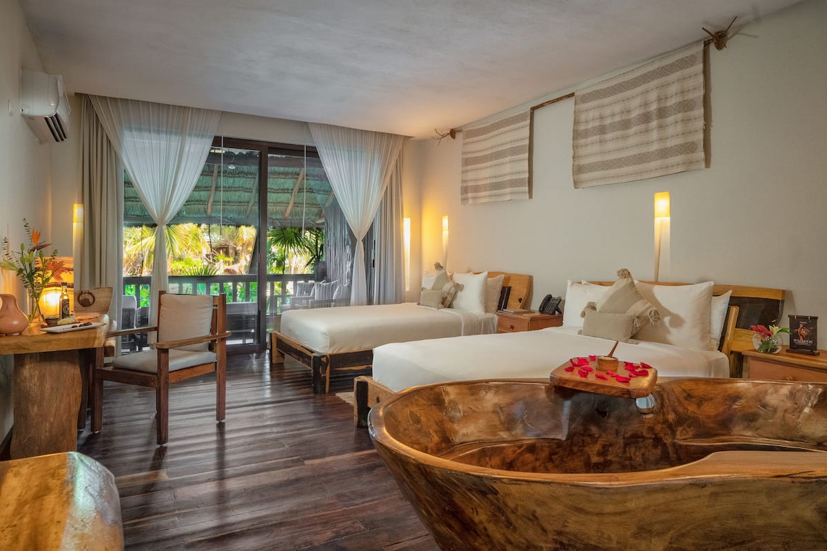 1 kamar tidur, seprai premium, minibar, dan brankas