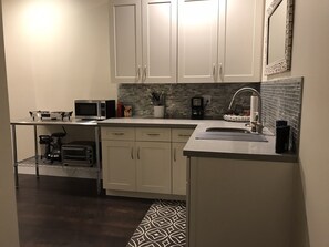 Fridge, microwave, coffee/tea maker, toaster