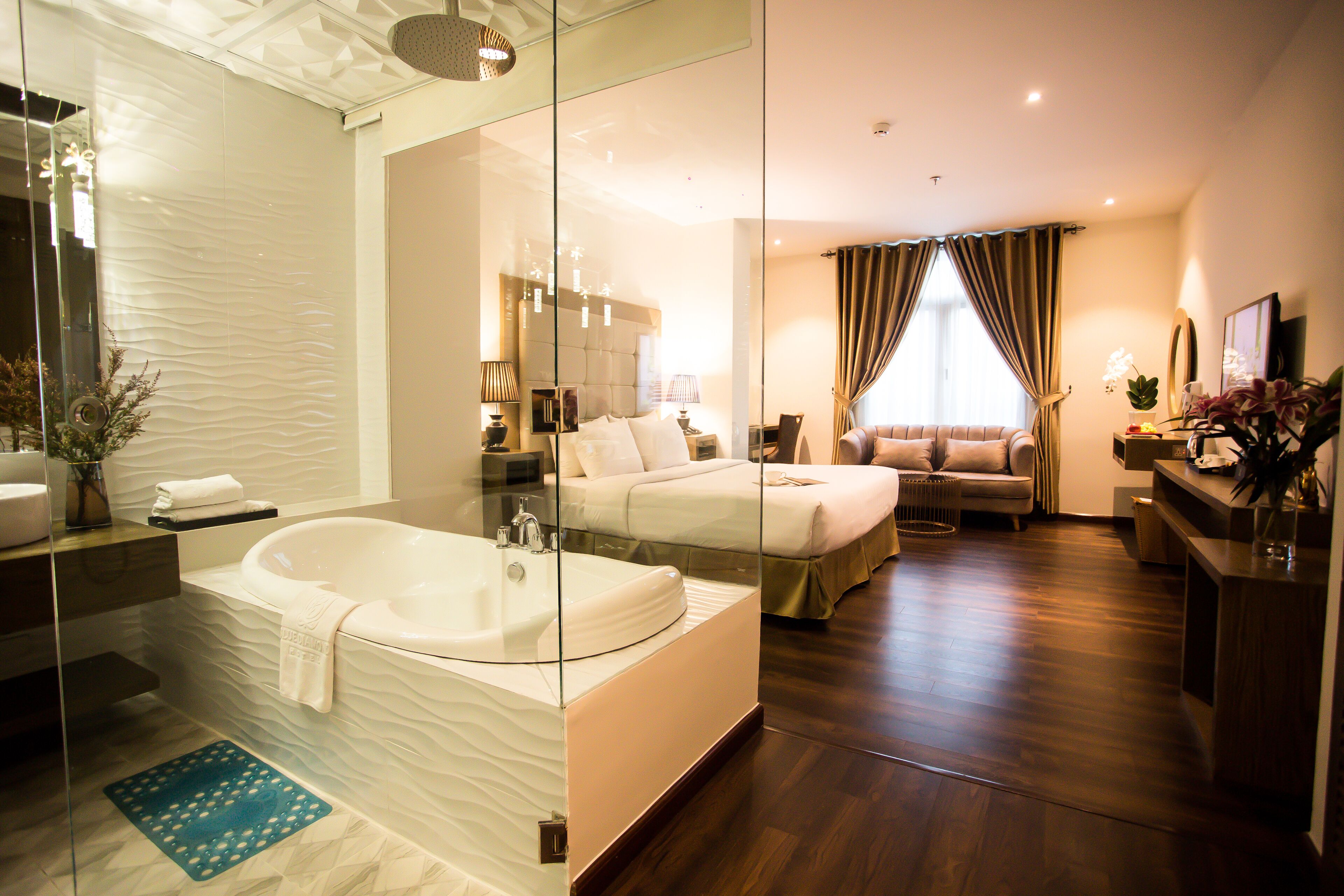 grand room | premium bedding, minibar, in-room safe, individually decorated