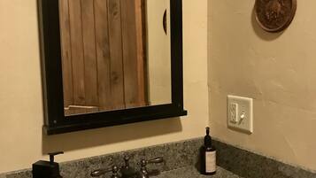 Combined shower/tub, hair dryer, towels, shampoo