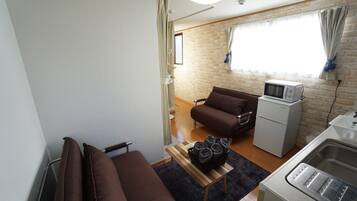 Apartamento | Área de estar | TV de tela plana