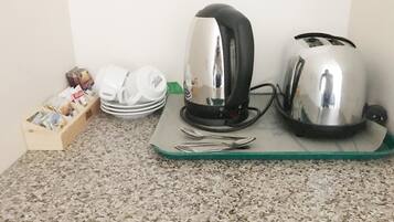 Fridge, microwave, coffee/tea maker, electric kettle