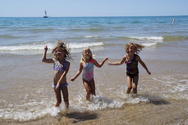 Oh what fun it is! Notice the clear water of Lake Michigan's South Beach.