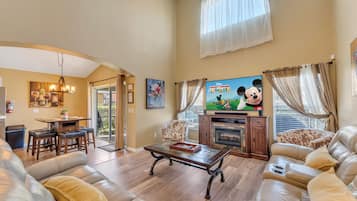 Smart TV, chimenea, reproductor de DVD y futbolito