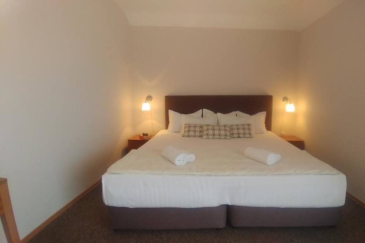 Apartment, 1 Bedroom, Balcony | Minibar, desk, WiFi (free), bed sheets