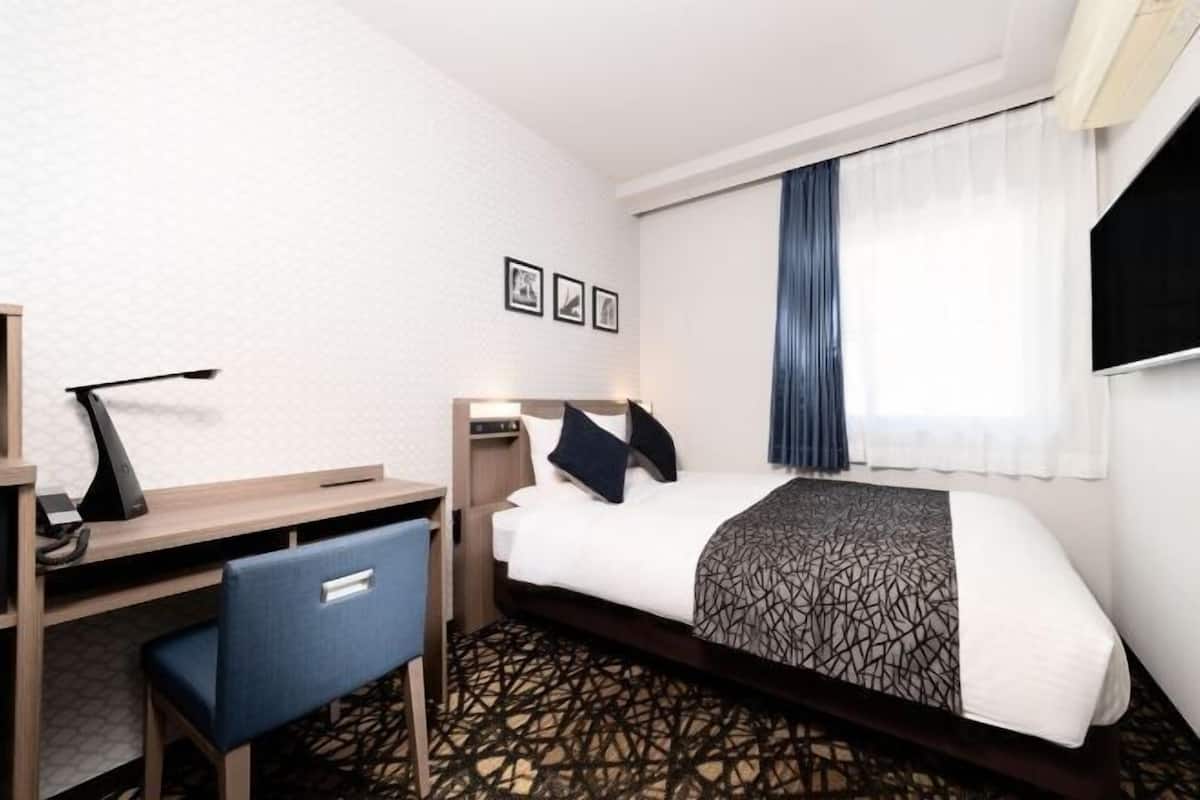 1 slaapkamer, een bureau, gratis wifi, beddengoed