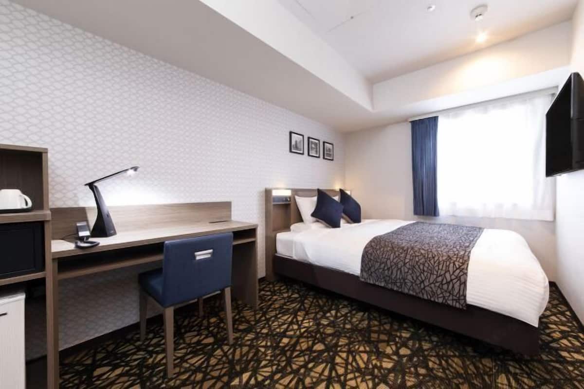 1 slaapkamer, een bureau, gratis wifi, beddengoed