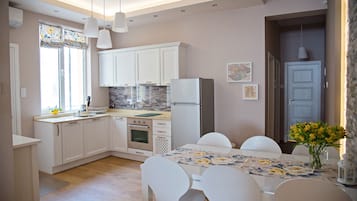 Family Apartment, 2 Bedrooms, Balcony, City View | Living area | 28-inch flat-screen TV with satellite channels, LED TV