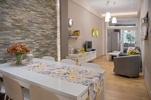 Family Apartment, 2 Bedrooms, Balcony, City View | Living area | 28-inch flat-screen TV with satellite channels, LED TV - The North Tower Apartment (Sofia)