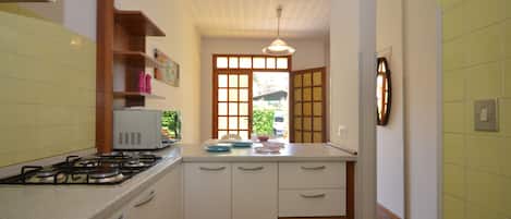 Standard Apartment, 3 Bedrooms, Terrace | Private kitchen | Full-sized fridge, microwave, stovetop, cookware/dishes/utensils
