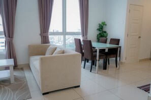 Appartement Affaires | Coin séjour | Télévision LED