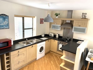 Apartemen Eksekutif, ensuite (Parking) | Dapur pribadi