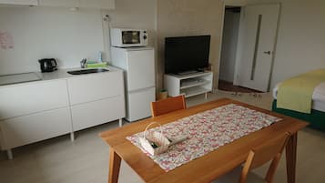 Quarto casal, vista para o oceano | Opções para refeição no quarto